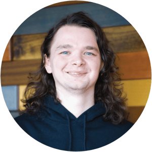 Justin Headshot Circle-min